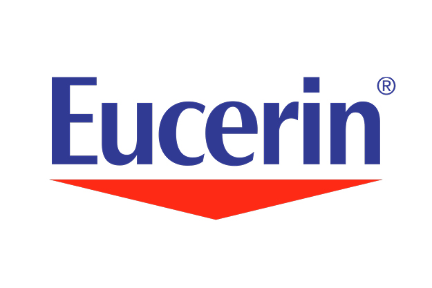 Das Eucerin-Logo zeigt den Markennamen „Eucerin“ in fetten, blauen Buchstaben mit einem kleinen eingetragenen Markensymbol über dem Buchstaben „n“. Unter dem Text befindet sich ein umgekehrtes rotes Dreieck, das den Markennamen unterstreicht. Der Hintergrund ist weiß.